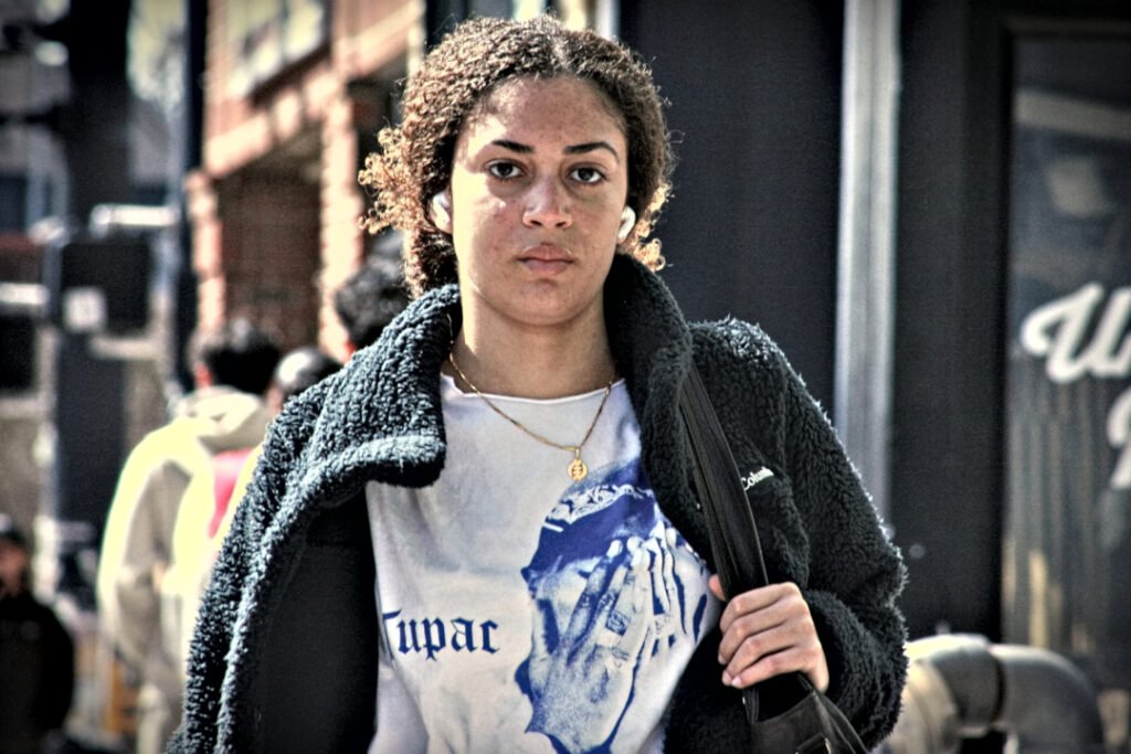 West Lafayette Downtown (Chauncey Village), 2026-03-29 - Woman Staring Ahead