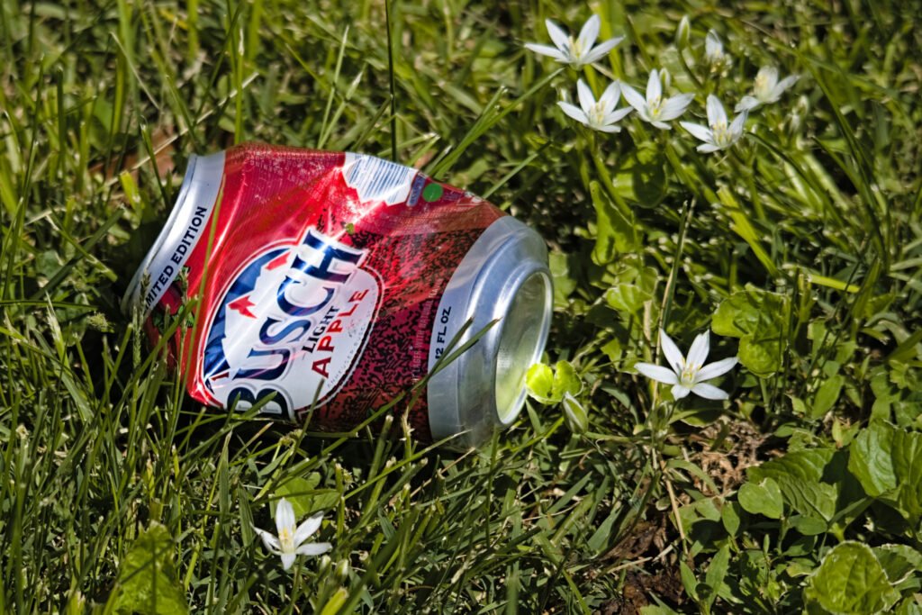 Busch Light Apple can among the flowers during Grand Prix Weekend